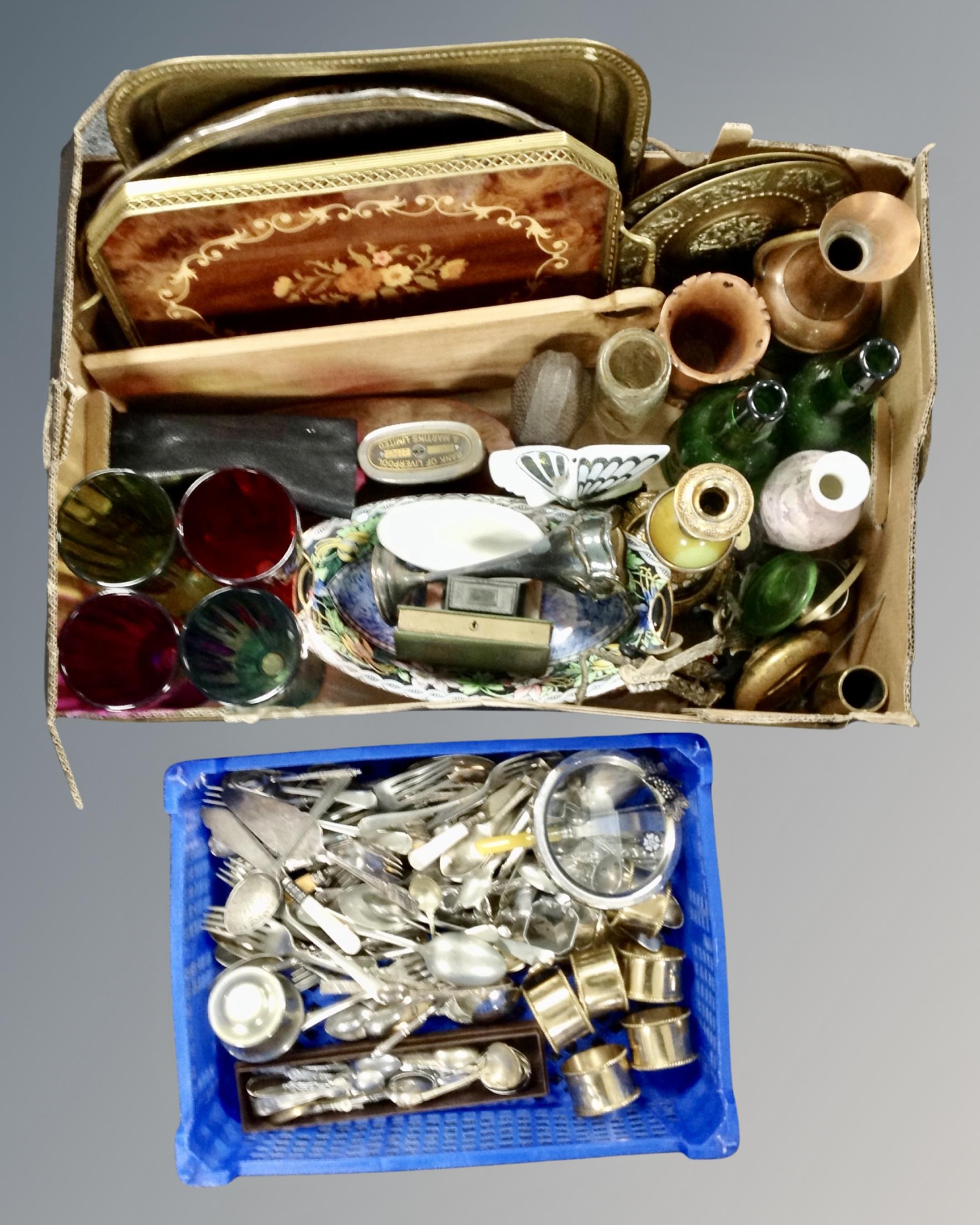 A box containing brass and wooden serving trays, coloured glasses, Maling lustre dish,
