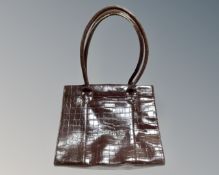 A lady's brown leather shoulder bag by Osprey London