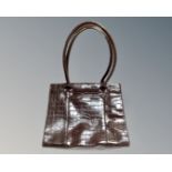 A lady's brown leather shoulder bag by Osprey London