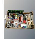 A box containing assorted drawing materials including precision drawing set, writing utensils etc.