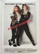 A Madonna Desperately Seeking Susan poster together with vintage photographs of Elvis Presley,