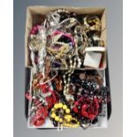 A tray containing a large quantity of costume jewellery including bead necklaces, bangles etc.