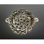 A 9ct gold and silver marcasite ring, size M.