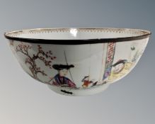 A 19th century Chinese porcelain fruit bowl, painted with figures in traditional dress,