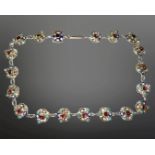 A white metal, enamelled, turquoise and garnet set necklace, with 10ct gold clasp, length 37cm.