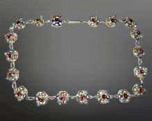 A white metal, enamelled, turquoise and garnet set necklace, with 10ct gold clasp, length 37cm.