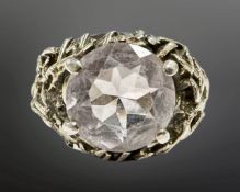 An ornate silver gem set ring, size O.