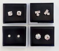 A collection of four pairs of Diamante earrings, in cases.