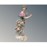 A Derby porcelain figure of a female musician (a/f)