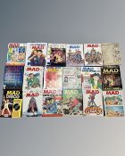 A collection of vintage Mad Magazine issues, dated from the 1960s to the 1980s,