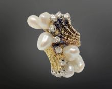 An 18ct gold pearl and diamond abstract ring, size G CONDITION REPORT: 14.