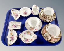 A tray containing two Royal Crown Derby Imari pattern teacups and saucers together with eight