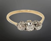 An antique 18ct gold three stone diamond ring, size O CONDITION REPORT: 1.