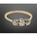 An antique 18ct gold three stone diamond ring, size O CONDITION REPORT: 1.