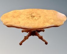 An Italian style shaped pedestal coffee table.