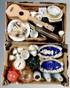 Two boxes containing Maling bowls, ukulele, glass light shades, assorted china, figurines etc.