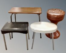 Four 20th century plastic topped stools, three on metal legs.