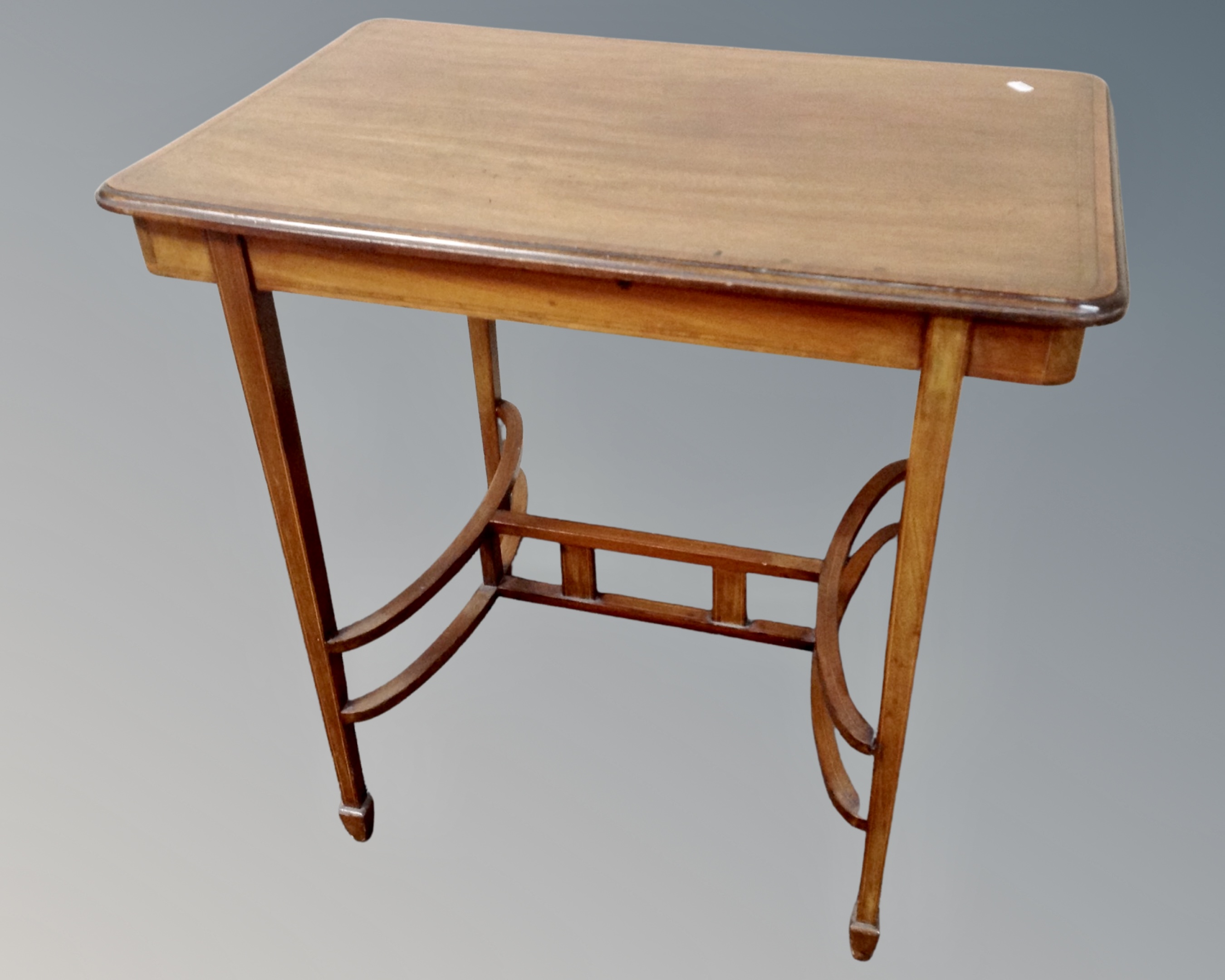 A 19th century mahogany satinwood inlaid occasional table with understretcher