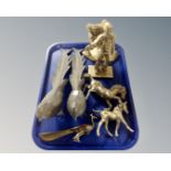 A box containing a pair of pheasant table ornaments together with further brass ornaments including
