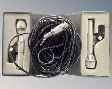 Two AKG D190E microphones, cased, together with two microphone wires.