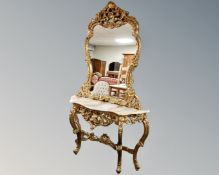 An ornate Venetian style gilt and onyx topped console table with matching mirror.