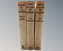 Two volumes, Seven Pillars of Wisdom, by T. E.