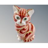 A Royal Crown Derby seated cat paperweight with silver stopper.