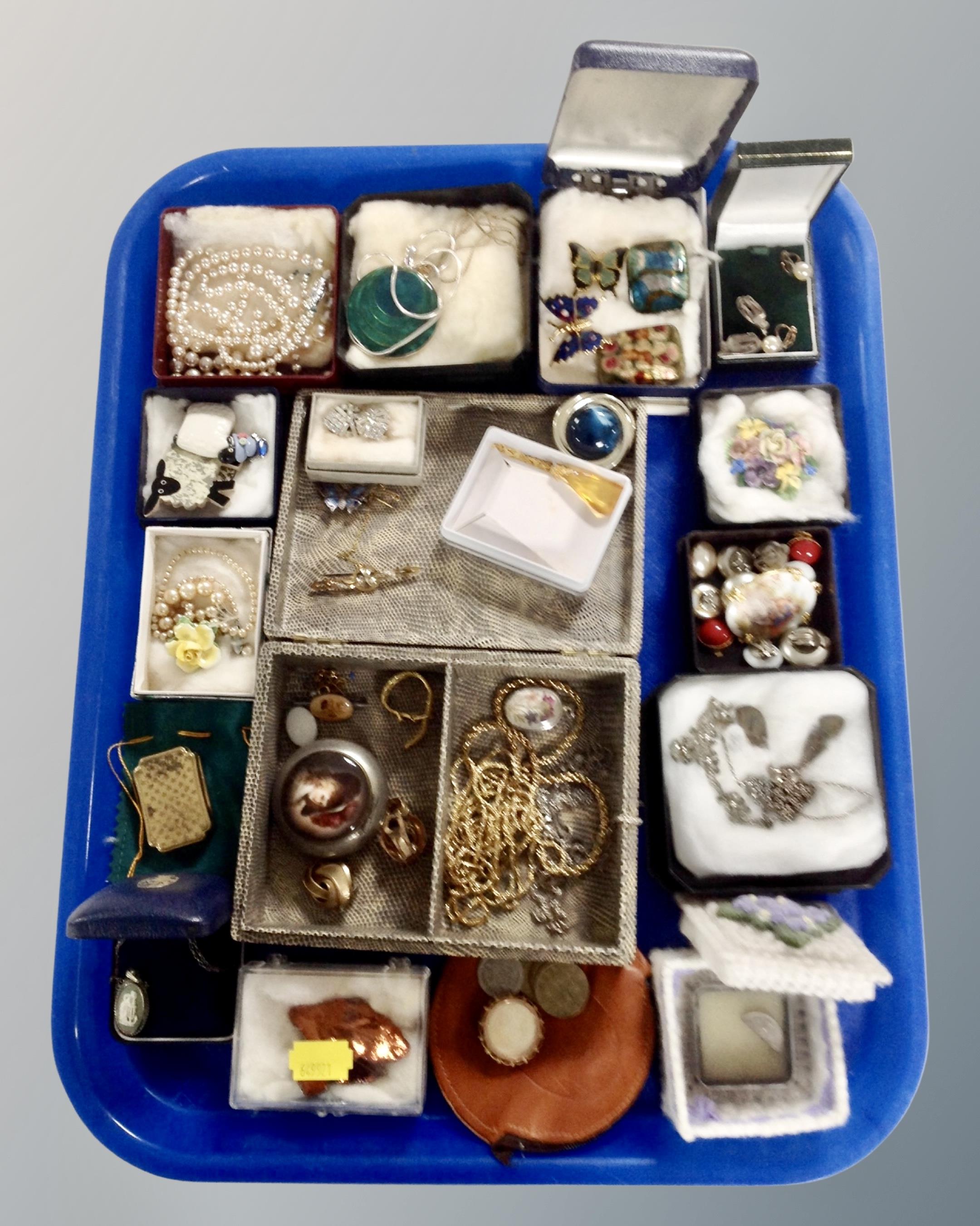 A tray containing assorted costume jewellery, a 9ct gold and seed pearl brooch,