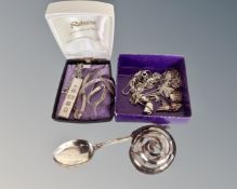 A collection of silver jewellery including ingot on chain and a silver teaspoon