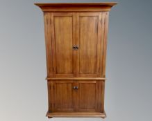 A contemporary double door hanging wardrobe,