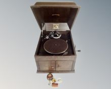 An early 20th century oak cased HMV gramophone with HMV no.