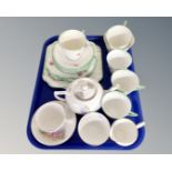 Eighteen pieces of Vale china hand decorated bone tea china and a five piece Queen Anne bone china