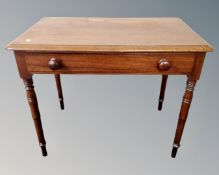 A Victorian mahogany side table fitted with a drawer.
