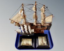 Two wooden models of the Cutty Sark and HMS Victory,
