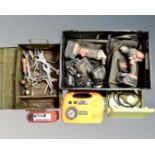 A crate containing Von Haus power tools with batteries and chargers,