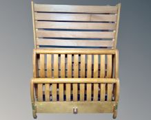 A 4'6" pine bed frame.