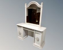 A contemporary mirrored twin pedestal dressing table fitted with three drawers together with a pair