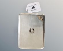 A silver cigarette case, Chester 1929, 150.3g, with RAF emblem to front.
