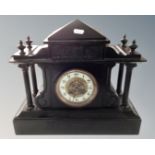 A 19th century black slate mantel clock.