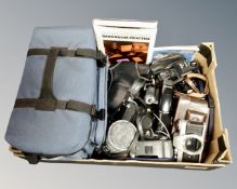 A box of camera bag, cameras including Canon T50,