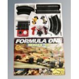 A Formula 1 Scalextric set in box.