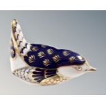 A Royal Crown Derby wren paperweight with gold stopper.