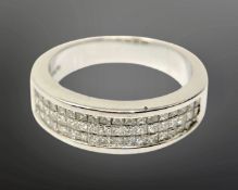 An 18ct white gold ring set with 54 princess cut diamonds CONDITION REPORT: Lot 147