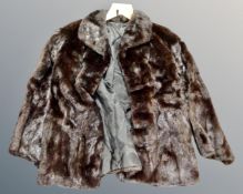 A lady's brown mink fur coat.