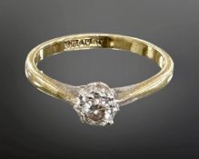 An 18ct gold and platinum solitaire diamond ring. CONDITION REPORT: 2.