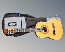 An Admira classical guitar with carry bag.