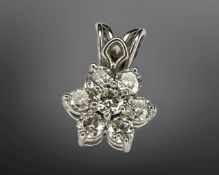 A white gold seven stone diamond cluster pendant, length 15mm CONDITION REPORT: 1.