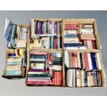 Six boxes containing hard and soft back volumes including novels, reference,