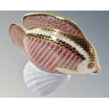 A Royal Crown Derby tropical fish paperweight with silver stopper.