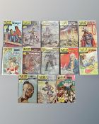 A collection of vintage Classics Illustrated comics including Alice in Wonderland,